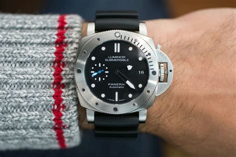 panerai submersible on hand